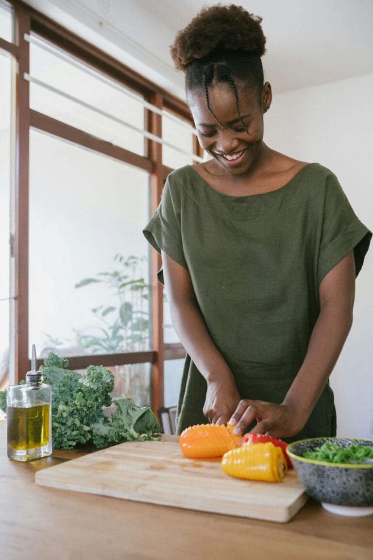 Househelp preparing food in a modern kitchen in Kenya