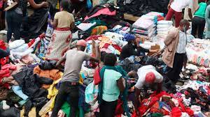 Shopper browsing clothes at Gikomba market Nairobi