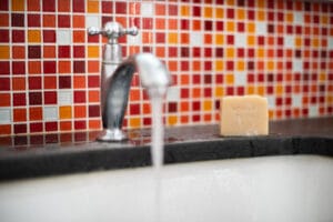 Running water from tap after emergency plumbing repair in Nairobi home