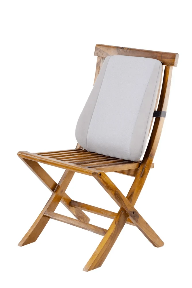 Polished wooden folding chair with slatted seat and light gray cushioned backrest Nairobi Kenya