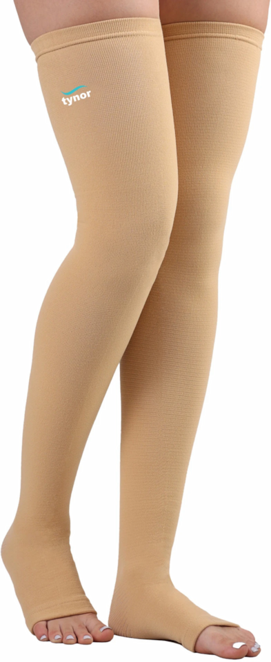 Pair of beige thigh‑high Tynor compression stockings with open‑toe design for circulation support Nairobi Kenya.