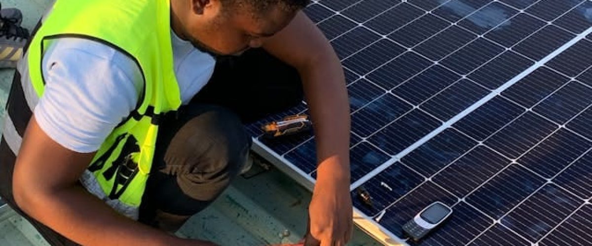 solar company Kenya technician rooftop installation